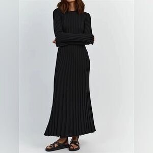 NWT long black ribbed sweater dress with flared cuffs and hem